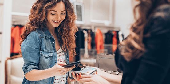 shopper paying with mobile device