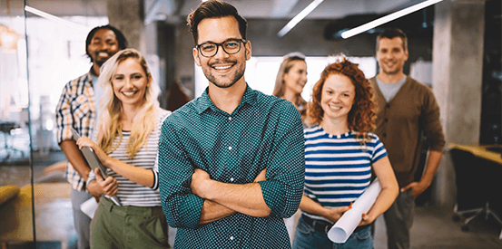 Group of people smiling at work