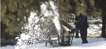 Man using snow plow