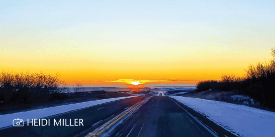 Sunset image of snowy highway