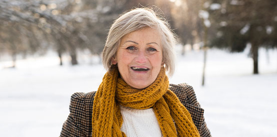 Borrow Woman Skating Winter mature person wearing gold scarf