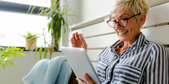 Mature Lady with Tablet