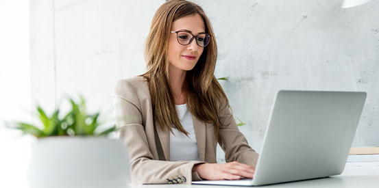 Young Professional on Laptop 553X275 Young Professional on Laptop 553X275